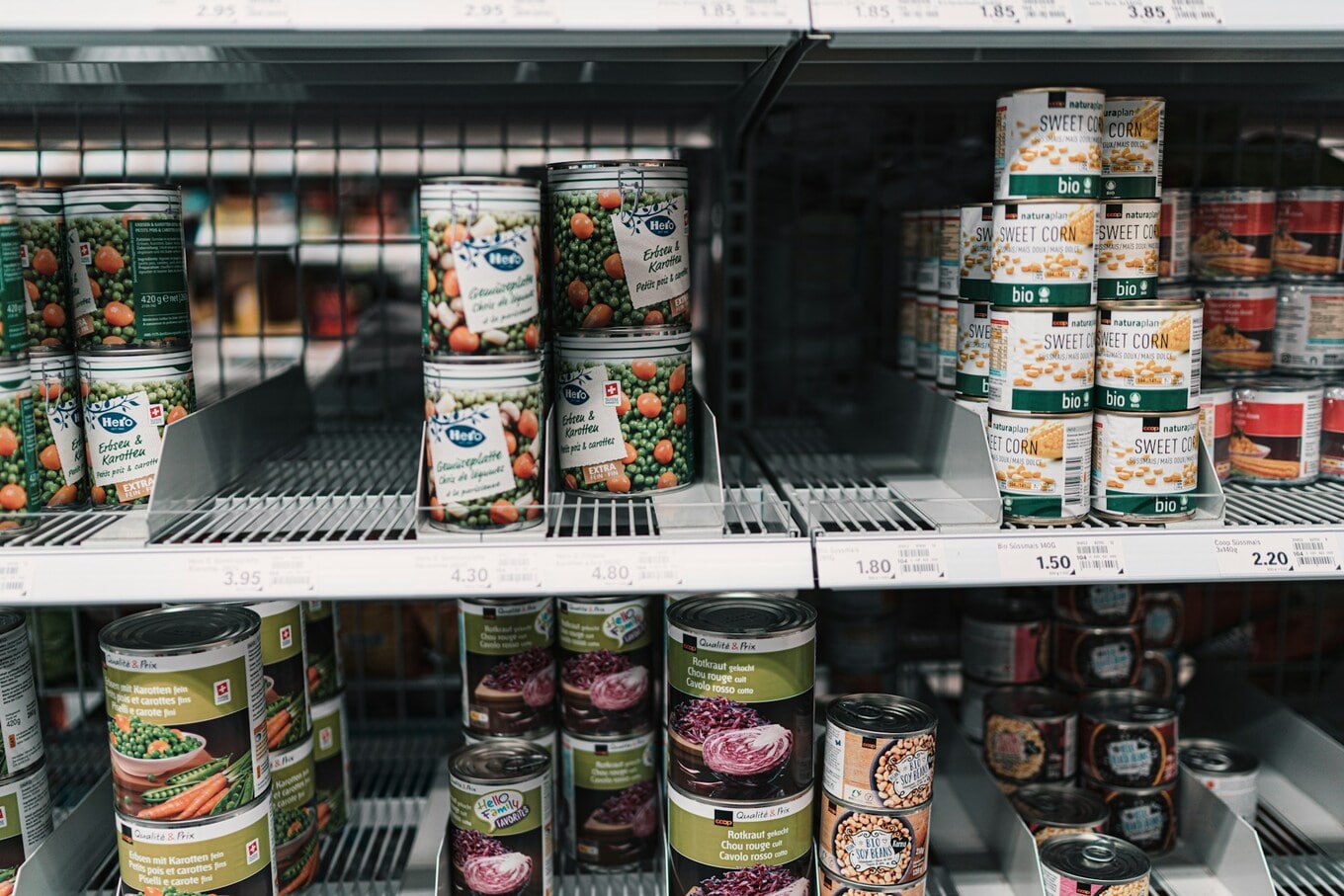 canned foods on grocery store shelves